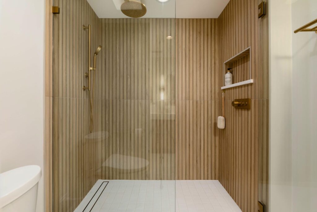 Throop St Primary Bathroom Renovation: A Modern Wood-Look Oasis