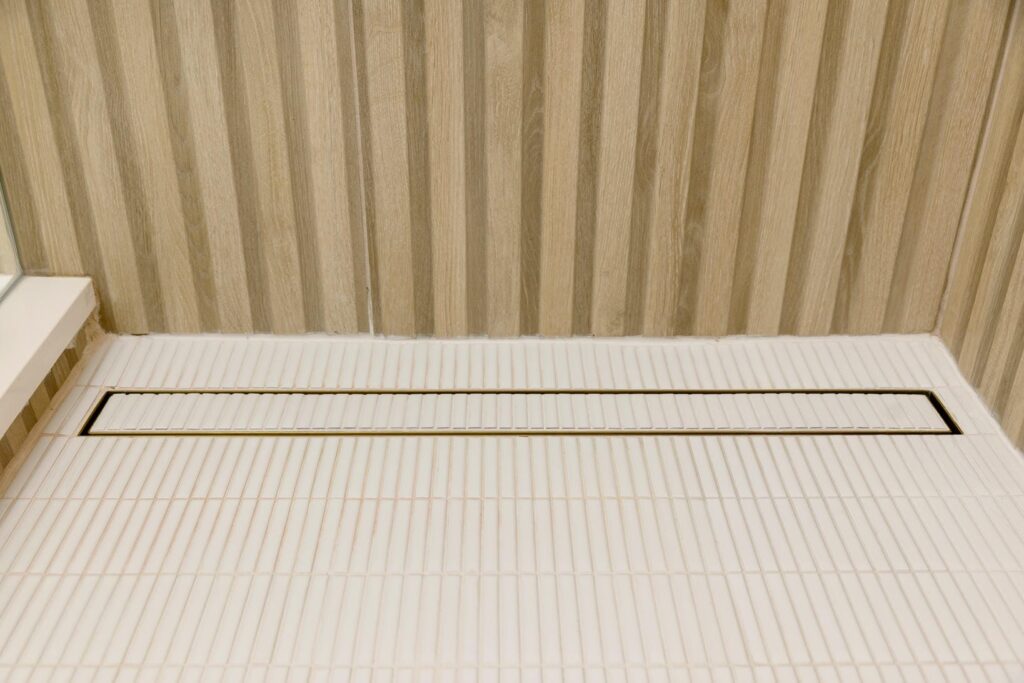 Throop St Primary Bathroom Renovation: A Modern Wood-Look Oasis
