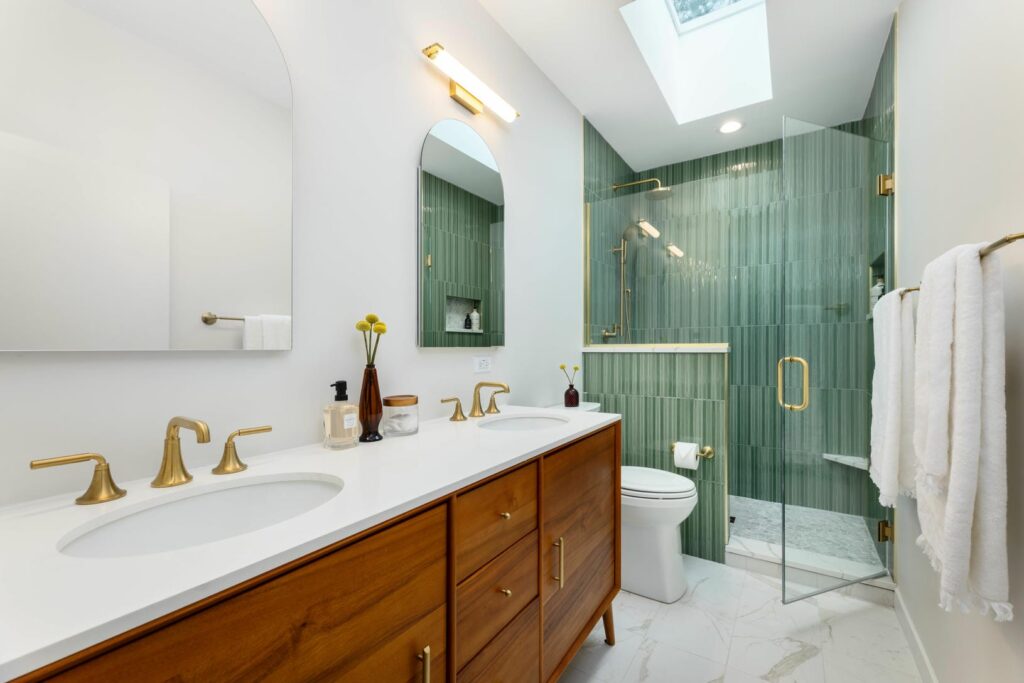 Oakley Blvd modern bathroom remodel featuring green tiles and clean, elegant finishes